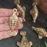 Small bronze fish pendant
